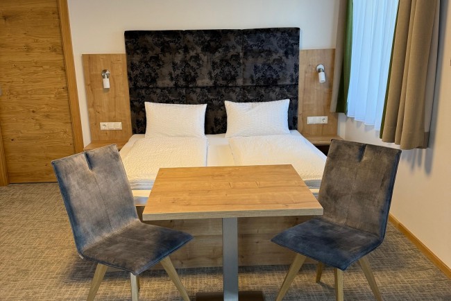 Doppelbett in der Pension Zum wilden Hannes