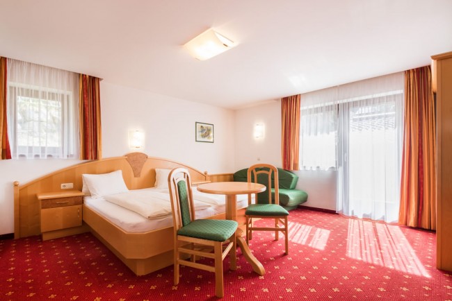 Gem&uuml;tliches Dreibettzimmer in der Pension Zum wilden Hannes